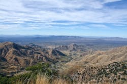 The Quinlan Mountains and Sonoran Desert as viewed from the Kitt Peak National Observatory on the Tohono O`odham Indian Reservation in Arizona. The Quinlan Mountains and Sonoran Desert as viewed from the Kitt Peak National Observatory on the Tohono O`odham Indian Reservation in Arizona.