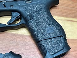 Talon Gun Grips on the frame and the magazine extension, precut from Talon. Talon Gun Grips on the frame and the magazine extension, precut from Talon.