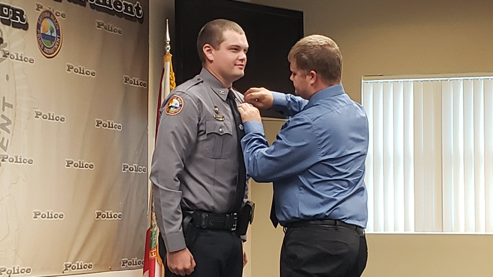 This photo, from 2019, shows Jason Raynor being sworn in as a Daytona Beach police officer.