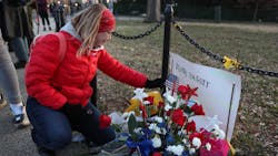 Melody Black becomes emotional as she visits a memorial setup near the U.S. Capitol Building for Ashli Babbitt, who was killed in the building after a pro-Trump mob broke in, on Jan. 6. Melody Black becomes emotional as she visits a memorial setup near the U.S. Capitol Building for Ashli Babbitt, who was killed in the building after a pro-Trump mob broke in, on Jan. 6.
