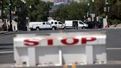First responders arrive on the scene to investigate a report of an explosive device in a pickup truck near the Library of Congress on Capitol Hill on Thursday in Washington, D.C. First responders arrive on the scene to investigate a report of an explosive device in a pickup truck near the Library of Congress on Capitol Hill on Thursday in Washington, D.C.