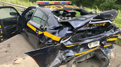 A chain reaction accident forced a New York State Police trooper to dive out of the way of his own patrol call during a traffic stop in Onondaga, NY, on Saturday.