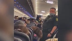 Broward County, FL, sheriff's deputies remove a passenger who lit a cigarette aboard a Spirit Airlines flight Tuesday. Broward County, FL, sheriff's deputies remove a passenger who lit a cigarette aboard a Spirit Airlines flight Tuesday.