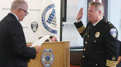 Akron, OH, Mayor Dan Horrigan administers the oath of office to Akron Police Chief Steve Mylett on Thursday during a swearing-in ceremony at the Harold Stubbs Safety Building in Akron.