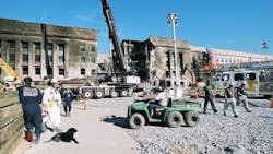 FEMA Urban Search and Rescue workers continue their work at the Pentagon in Arlington, Virginia on September 17, 2001.
