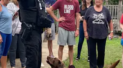 Forsyth County, GA, Sheriff's Office Sgt. Noah Sprague and K9 Buzz.