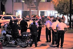 Police stand at attention as the alert tone comes over the radio at Halifax Health that Daytona Beach Police officer Jason Raynor had passed away on Tuesday, Aug. 17, 2021. Police stand at attention as the alert tone comes over the radio at Halifax Health that Daytona Beach Police officer Jason Raynor had passed away on Tuesday, Aug. 17, 2021.