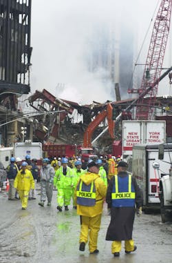 New York City Police and other rescue workers navigate the streets around the collapsed World Trade Center in downtown Manhattan on September 14, 2001. New York City Police and other rescue workers navigate the streets around the collapsed World Trade Center in downtown Manhattan on September 14, 2001.