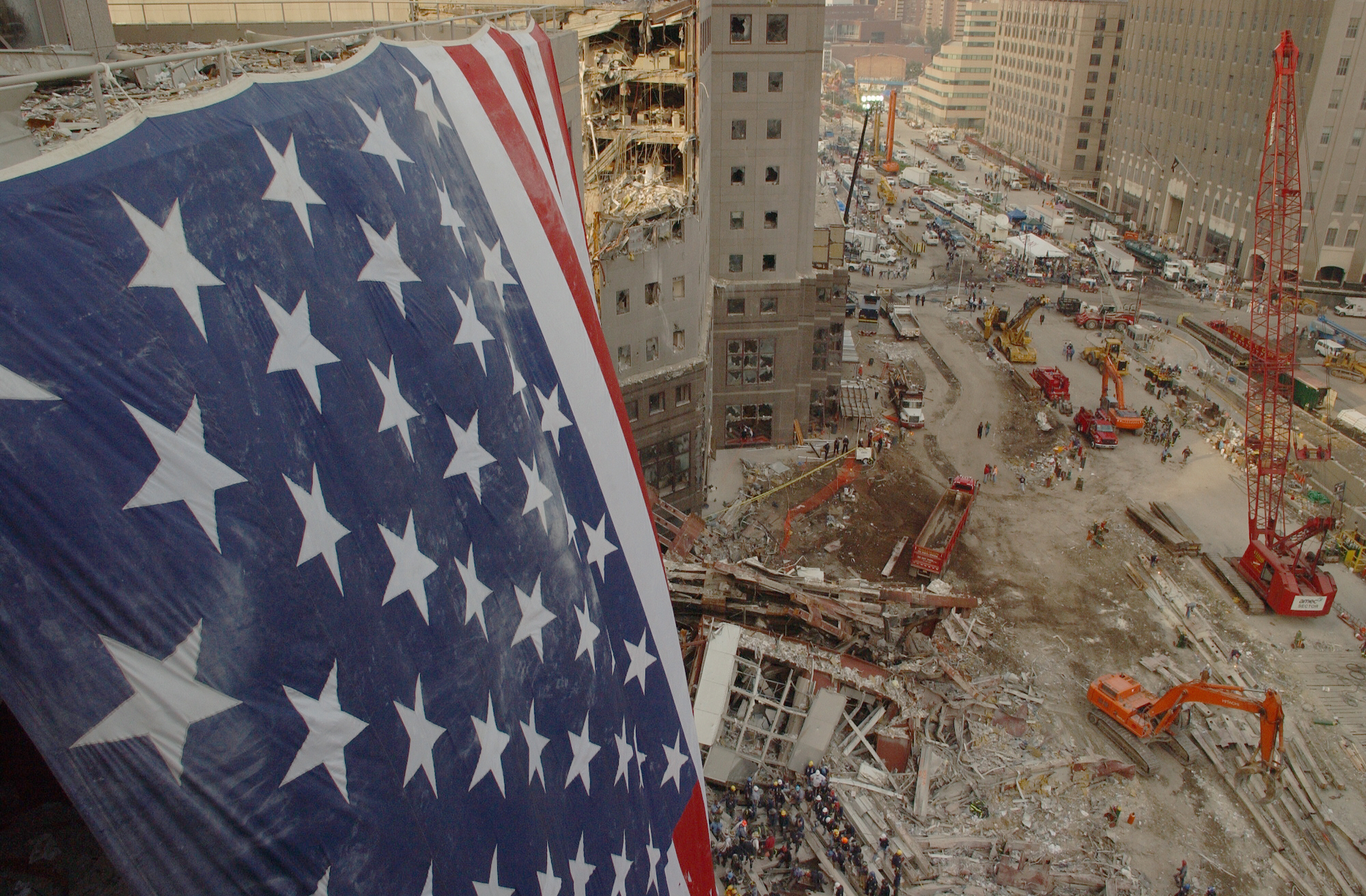 An American flag hangs above the wreckage at the World Trade Center in New York City on September 17, 2001.