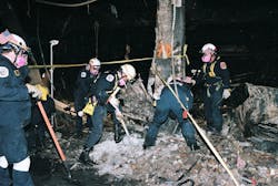Urban Search and Rescue crews from Montgomery County work to clear debris and strengthen support at the crash site in Arlington, Virginia on September 13, 2001. Urban Search and Rescue crews from Montgomery County work to clear debris and strengthen support at the crash site in Arlington, Virginia on September 13, 2001.