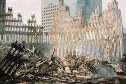 The remaining section of the World Trade Center is surrounded by a mountain of rubble following the September 11 terrorist attacks in New York City on September 27, 2001. The remaining section of the World Trade Center is surrounded by a mountain of rubble following the September 11 terrorist attacks in New York City on September 27, 2001.