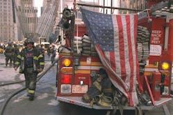Firefighters continue to battle smouldering fires and clean up the wreckage at the World Trade Center in New York City. on Sept. 13, 2001. Firefighters continue to battle smouldering fires and clean up the wreckage at the World Trade Center in New York City. on Sept. 13, 2001.