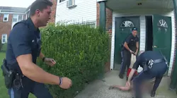 Three Bensalem Township, PA, police officers saved an unconscious man from the second floor of a burning apartment Aug. 25.