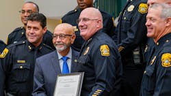 Tampa Police Chief Brian Dugan (center right) poses for a photo with Councilman Charlie Miranda and members of his command staff after Miranda presented Dugan with a commendation for his 31 years of service to the department on Sept. 2. Tampa Police Chief Brian Dugan (center right) poses for a photo with Councilman Charlie Miranda and members of his command staff after Miranda presented Dugan with a commendation for his 31 years of service to the department on Sept. 2.