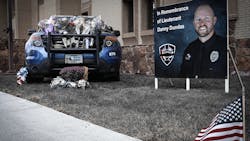 A memorial for Casper, WY, Police Lt. Dan Dundas, who took his life Monday, was erected outside the department and includes his squad car. A memorial for Casper, WY, Police Lt. Dan Dundas, who took his life Monday, was erected outside the department and includes his squad car.