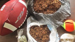 Officials at Morrison Correctional Institution in Richmond County, NC, discovered a drug- and tobacco-filled football that had been thrown over a fence and onto the prison grounds last week. Officials at Morrison Correctional Institution in Richmond County, NC, discovered a drug- and tobacco-filled football that had been thrown over a fence and onto the prison grounds last week.