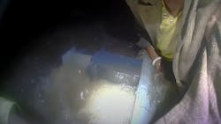 An Ewing, NJ, police officer rescued a woman clinging to a guard rail during Hurricane Ida flash flooding Sept. 1. An Ewing, NJ, police officer rescued a woman clinging to a guard rail during Hurricane Ida flash flooding Sept. 1.