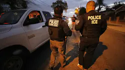 David A. Marin (right), field office director of enforcement and removal operations for the Los Angeles branch of U.S. Immigration and Customs Enforcement, works during a pre-dawn apprehension in Bell Gardens, CA, as ICE officers are joined by U.S. Customs & Border Protection agents in sanctuary cities. David A. Marin (right), field office director of enforcement and removal operations for the Los Angeles branch of U.S. Immigration and Customs Enforcement, works during a pre-dawn apprehension in Bell Gardens, CA, as ICE officers are joined by U.S. Customs & Border Protection agents in sanctuary cities.