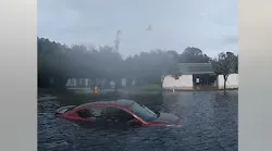 Two Pascagoula, MS, police officers rescued two people from flash flooding caused by Hurricane Ida on Tuesday.