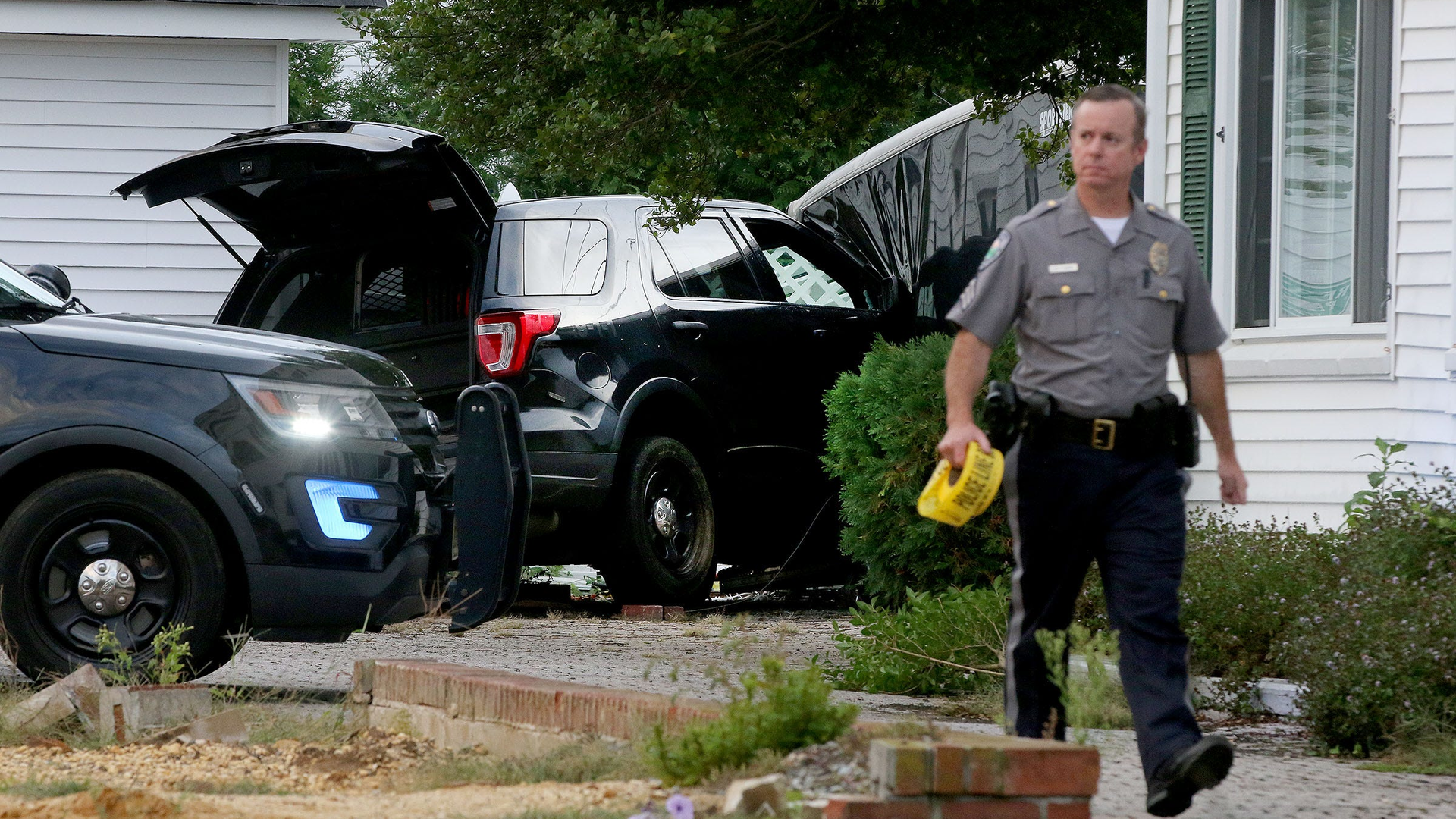 An unmarked police vehicle left the roadway and struck a structure and trailer at in Sea Girt, NJ, on Tuesday.