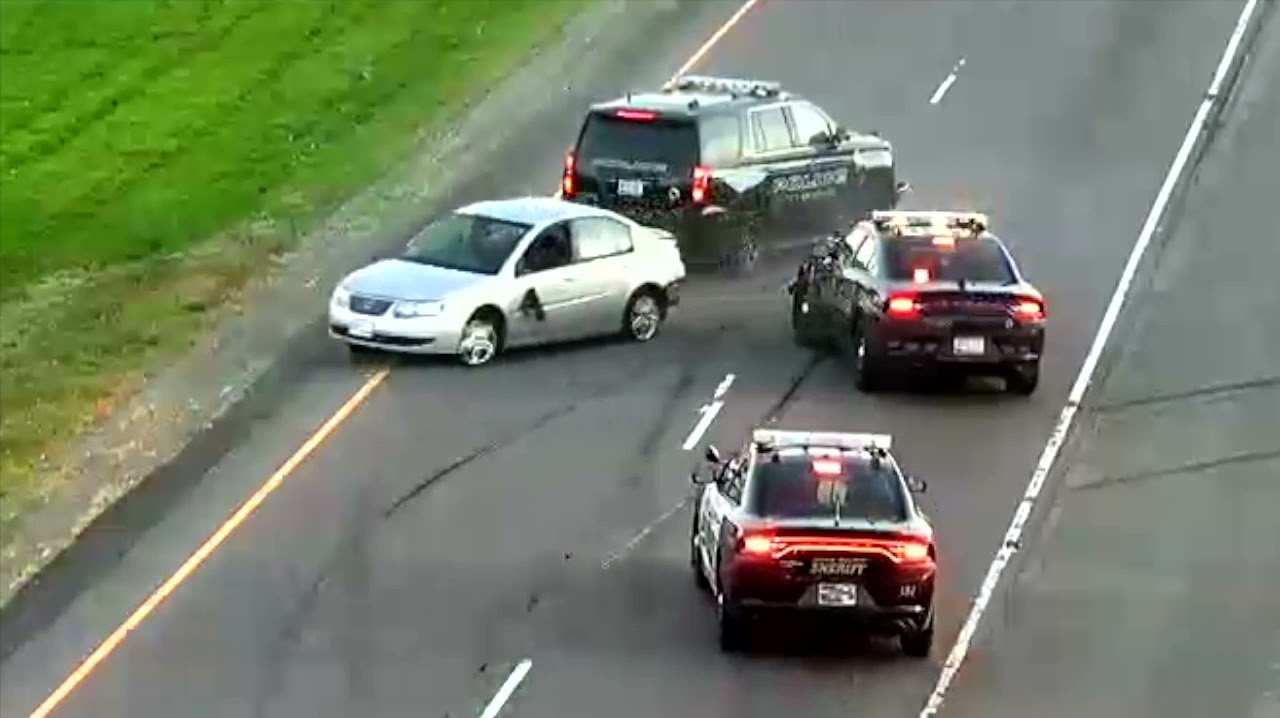 Watch Driver Ram Minn. Police Cars in Wild Chase | Officer