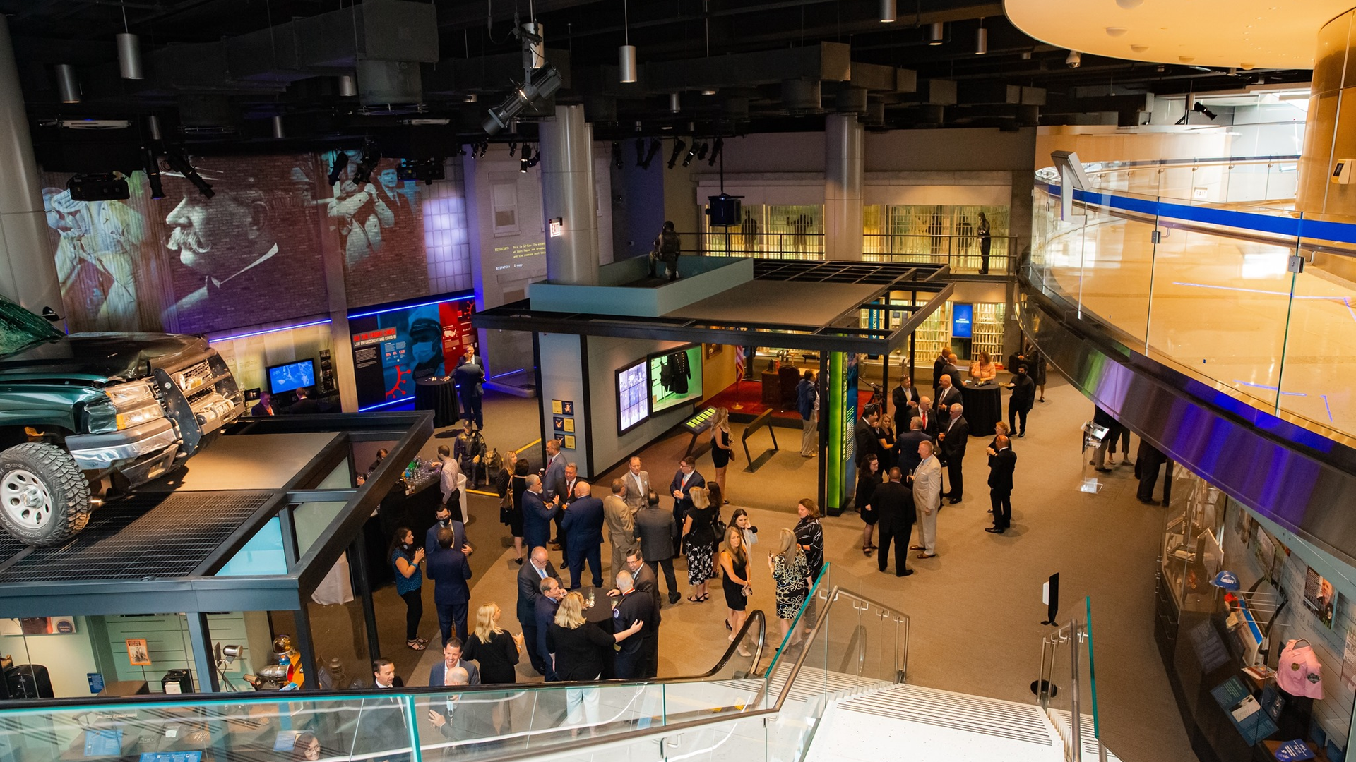 Visitors are seen during the National Law Enforcement Museum's Grand Reopening weekend.