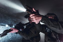 Weapon-mounted lights have gradually become the norm. Pictured here is the Streamlight TLR-VIR II mounted on both a pistol and a long gun. Weapon-mounted lights have gradually become the norm. Pictured here is the Streamlight TLR-VIR II mounted on both a pistol and a long gun.