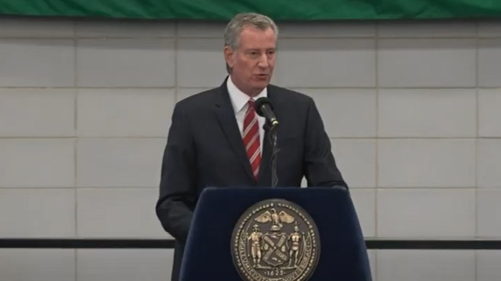 New York City Mayor Bill de Blasio speaks during the NYPD's annual Medal Day at Police Academy headquarters in Queens on Friday.
