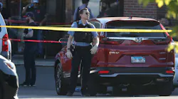 A Chicago police officer at the scene where an officer was shot Monday.
