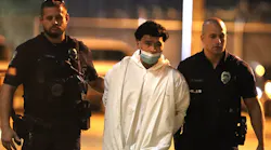 Suspect Jason Banegas, 18, is escorted by Hollywood, FL, police to be transferred to the Broward County Jail on Monday. Banegas is accused of killing Hollywood Police Officer Yandy Chirino. Cache: Officer HONORING THE FALLEN PUBLICATIONS SUBSCRIBE ADVERTISE CONTACT US LOG IN REGISTER VEHICLES & FLEET TACTICAL TRAINING & CAREERS ON THE STREET INVESTIGATIONS COMMAND/HQ JOBS PRODUCT GUIDE FORUMS INVESTIGATIONS Teen Accused of Killing Fla. Officer Freed from Jail Last Month Oct. 19, 2021 The 18-year-old who allegedly shot and killed Hollywood Police Officer Yandy Chirino had been let out of jail on burglary, trespassing and cocaine charges 30 days ago. By Eileen Kelley Source South Florida Sun-Sentinel Carline Jean | South Florida Sun-Sentinel Suspect Jason Banegas, 18, is escorted by Hollywood, FL, police to be transferred to the Broward County Jail on Monday. Banegas is accused of killing Hollywood Police Officer Yandy Chirino. Suspect Jason Banegas, 18, is escorted by Hollywood, FL, police to be transferred to the Broward County Jail on Monday. Banegas is accused of killing Hollywood Police Officer Yandy Chirino. Stepping before a judge is something that Jason Banegas, the teen charged in the shooting death of a Hollywood police officer, has done before. It was just 30 days ago that the 18-year-old was freed from jail in Miami-Dade County on burglary, trespassing and cocaine charges. Now Banegas faces the prospect of never being a free man again. Banegas walked to the lectern and lowered his head Tuesday in bond court as Judge Tabitha Blackmon read through a heady list of charges he now faces, including first degree murder.