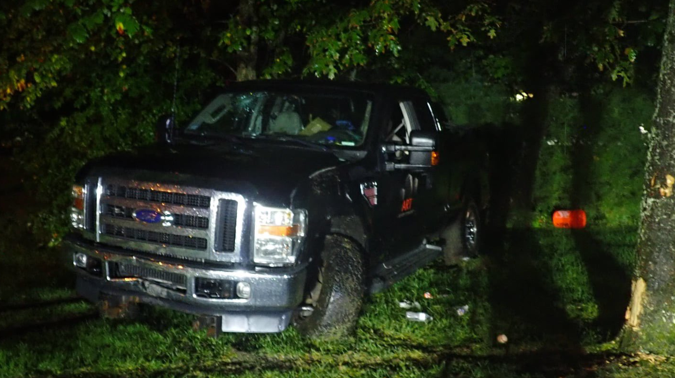A pickup truck driven by an alleged drunk driver crashed outside the entrance of the Pelham Police Department early Monday.