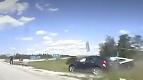A Florida Highway Patrol trooper crashed into an out-of-control vehicle to stop it from potentially running down a Polk County sheriff's deputy during a chase Sept. 27.