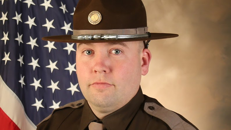 Iowa State Patrol Trooper Ted Benda, 37.