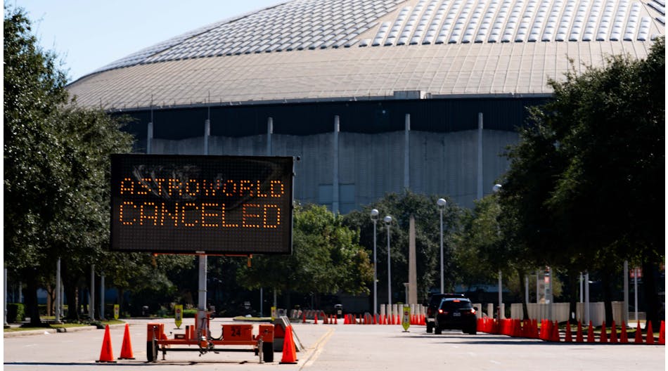 A street sign shows the cancellation of the Astroworld Festival at NRG Park in Houston on Saturday. According to authorities, eight people died and 17 people were taken to local hospitals after what they describe as a crowd surge at the Astroworld festival, a music festival started by Houston-native rapper and musician Travis Scott in 2018.