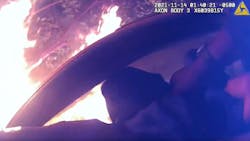 Atlanta police officers rescued a trapped driver Sunday from a car engulfed in flames after it went airborne and crashed into two houses and a car. Atlanta police officers rescued a trapped driver Sunday from a car engulfed in flames after it went airborne and crashed into two houses and a car.