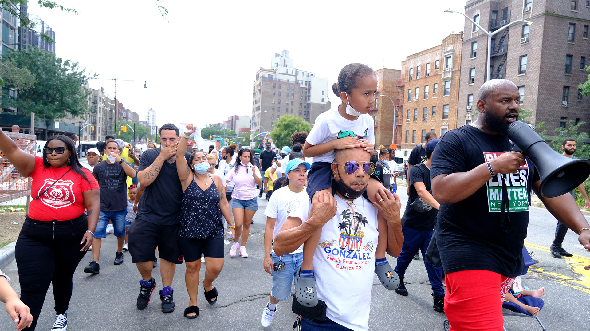 Hawk Newsome, who co-founded the Greater New York chapter of Black Lives Matter, holds a bullhorn during a march for a man killed during a gunfight with two off-duty NYPD officers this summer. On Wednesday, he met with Mayor-elect Eric Adams.
