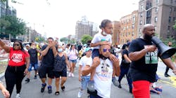 Hawk Newsome, who co-founded the Greater New York chapter of Black Lives Matter, holds a bullhorn during a march for a man killed during a gunfight with two off-duty NYPD officers this summer. On Wednesday, he met with Mayor-elect Eric Adams. Hawk Newsome, who co-founded the Greater New York chapter of Black Lives Matter, holds a bullhorn during a march for a man killed during a gunfight with two off-duty NYPD officers this summer. On Wednesday, he met with Mayor-elect Eric Adams.