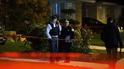 Police work at the scene where a 44-year-old off-duty Chicago police officer was fatally shot in the 8500 block of West Winona Street in the Oriole Park neighborhood on Tuesday.