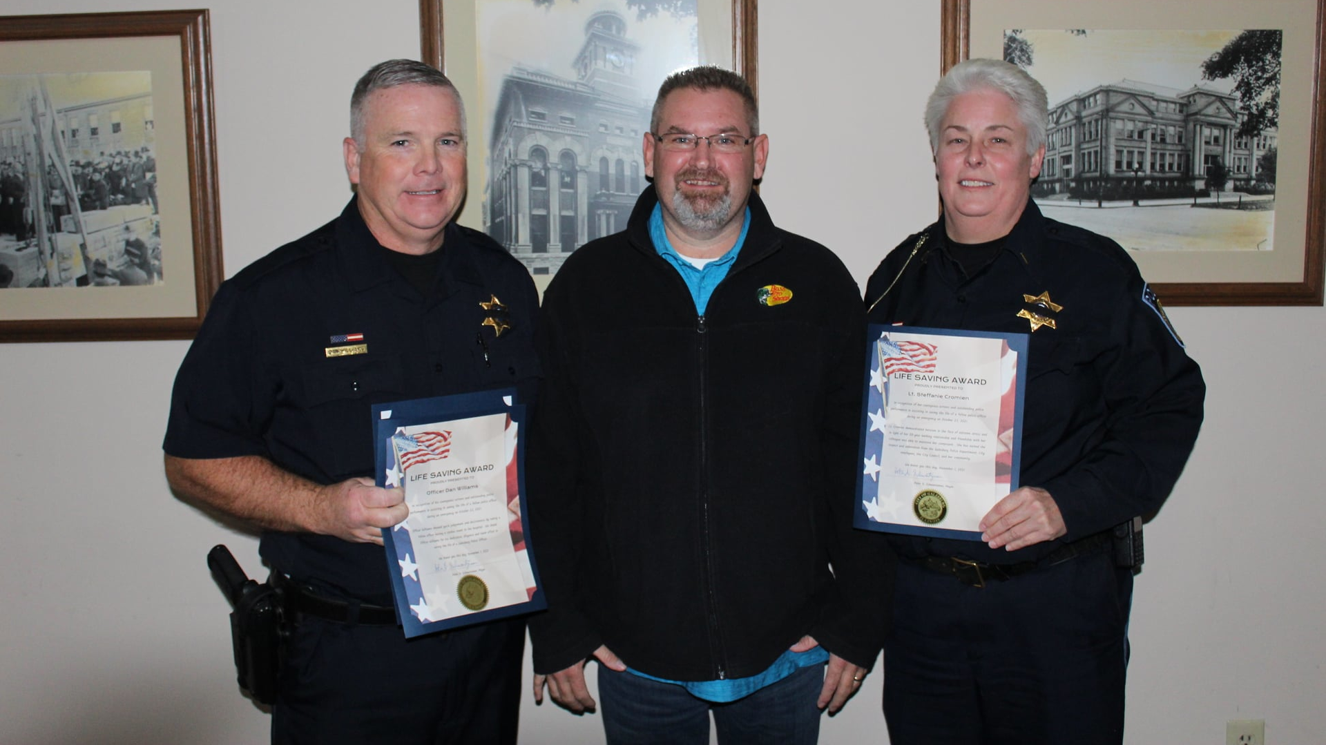 Galesburg, IL, Police Officer Dan Williams (left) and Lt. Steffanie Cromien were two of three officers given Life-Saver awards by Mayor Peter Schwartzman on Monday.