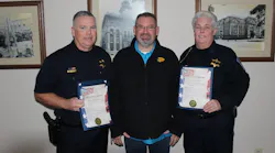 Galesburg, IL, Police Officer Dan Williams (left) and Lt. Steffanie Cromien were two of three officers given Life-Saver awards by Mayor Peter Schwartzman on Monday.
