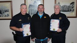 Galesburg, IL, Police Officer Dan Williams (left) and Lt. Steffanie Cromien were two of three officers given Life-Saver awards by Mayor Peter Schwartzman on Monday. Galesburg, IL, Police Officer Dan Williams (left) and Lt. Steffanie Cromien were two of three officers given Life-Saver awards by Mayor Peter Schwartzman on Monday.