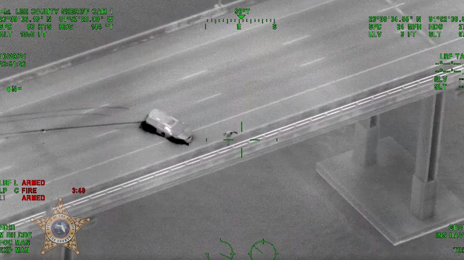 Watch Man Flee Fla. Deputies By Diving Off Bridge After Chase | Officer