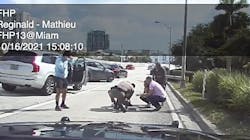 A Florida Highway Patrol trooper helps save a choking 1-year-old girl on the side of Interstate 95 in Miami in late October. A Florida Highway Patrol trooper helps save a choking 1-year-old girl on the side of Interstate 95 in Miami in late October.
