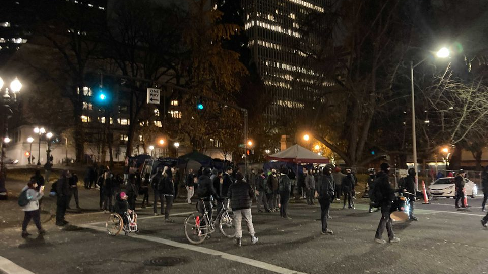 A group of people gathered Friday evening in downtown Portland, OR, to protest the not-guilty verdict in Wisconsin of Kyle Rittenhouse.