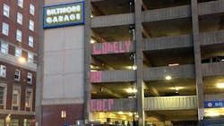 Providence, RI, police talked down a woman who was on the ledge of a parking garage roof Wednesday.