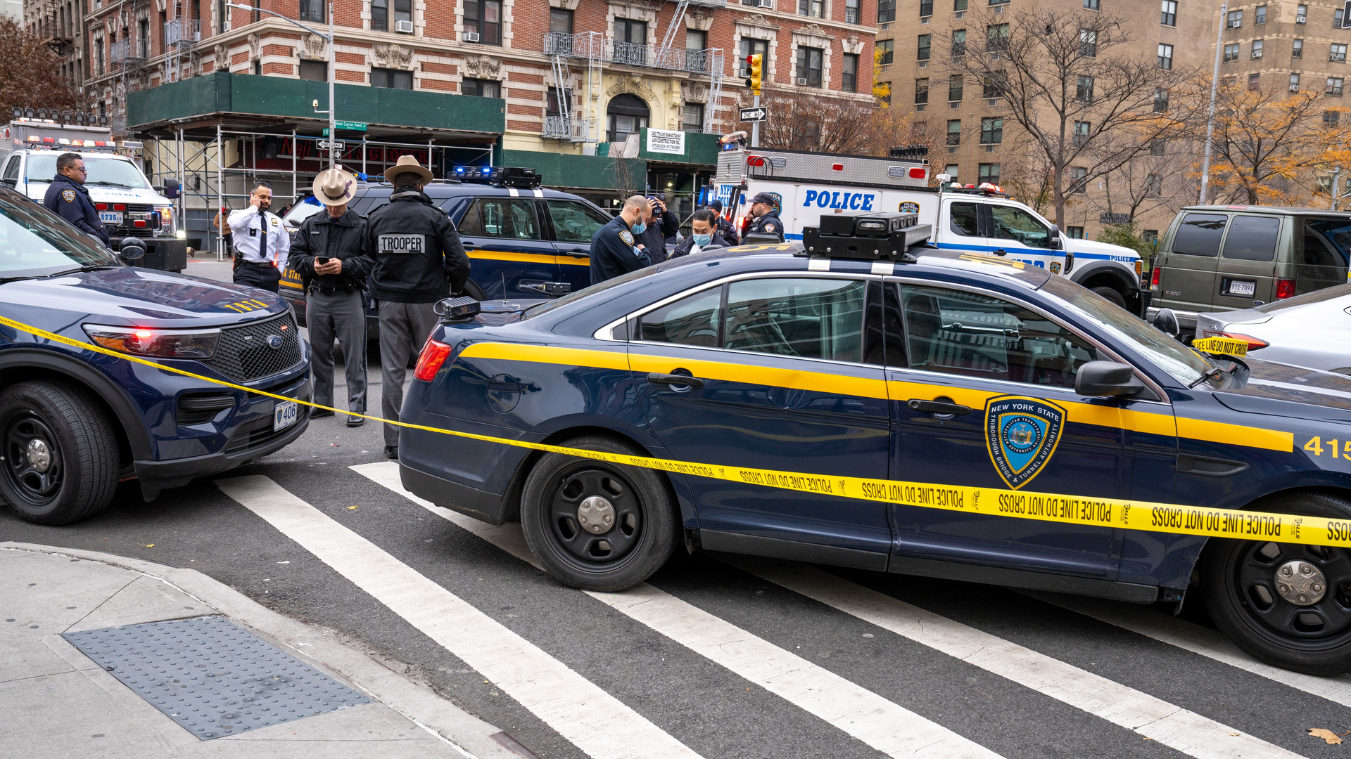 A New York State Police trooper suffered minor injuries when he was struck by a vehicle while conducting a traffic stop along the Robert F. Kennedy Bridge in New York City on Sunday.