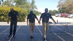 Rocklin, CA, police officers struggle to walk during a field sobriety test while testing 'alcohol impairment goggles.' Rocklin, CA, police officers struggle to walk during a field sobriety test while testing 'alcohol impairment goggles.'