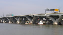 Woodrow Wilson Bridge, which crosses the Potomac River between Viriginia and Maryland. Woodrow Wilson Bridge, which crosses the Potomac River between Viriginia and Maryland.