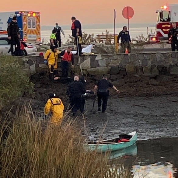 Westport, CT, police officers grabbed a nearby canoe to rescue a missing elderly man who was partially submerged in the cold waters off Saugatuck Shores Beach early Tuesday.