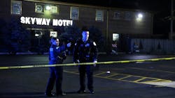 Chicago police investigate the scene outside the Skyway Motel at Stony Island and 92nd Street after a cop was shot on Dec. 1, 2021. Chicago police investigate the scene outside the Skyway Motel at Stony Island and 92nd Street after a cop was shot on Dec. 1, 2021.